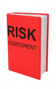 A picture of a red book entitled 'Risk Assessment'. 